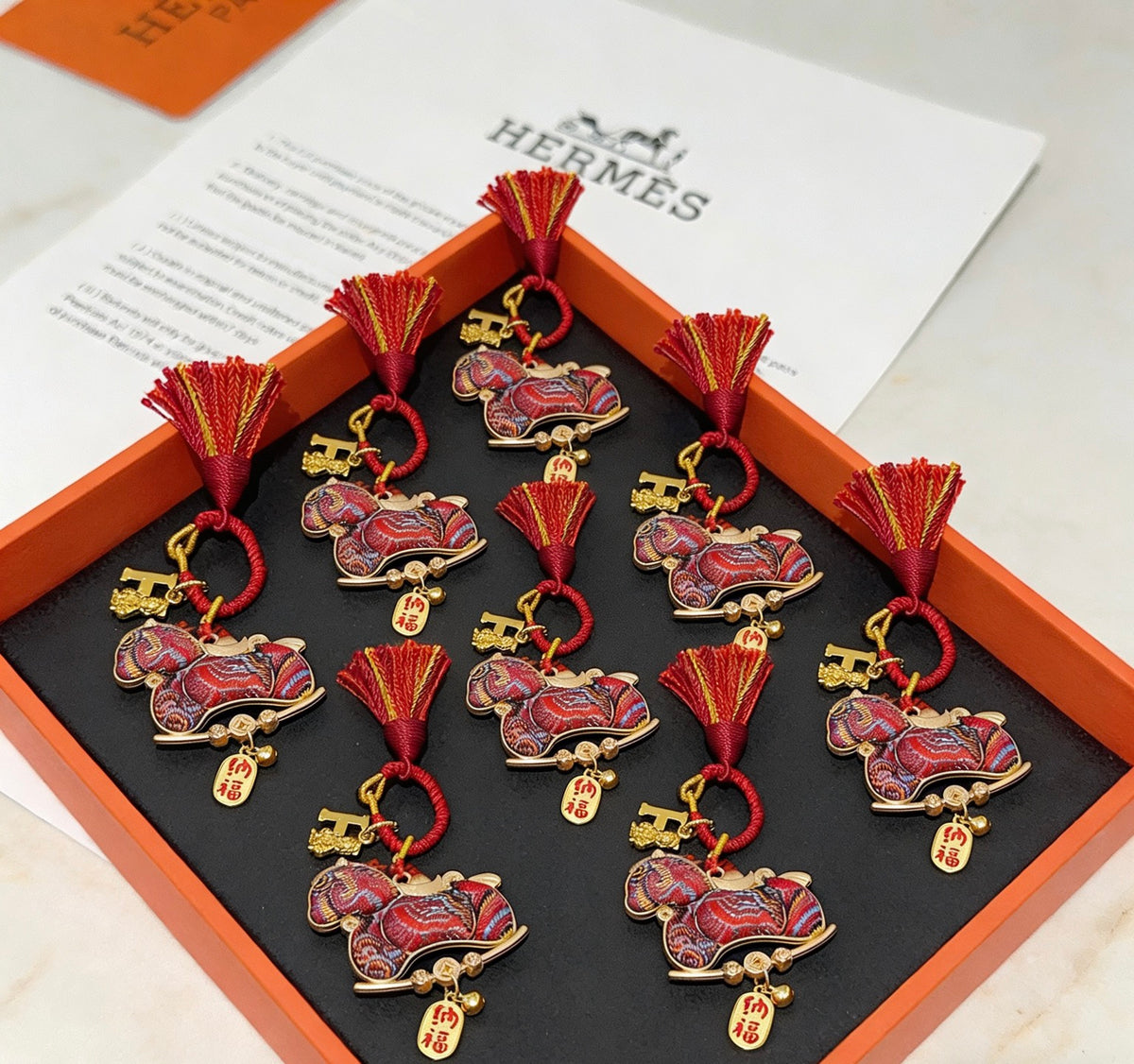 Hermès Red Letter-Patterned Horse Plush Toy - album image 1