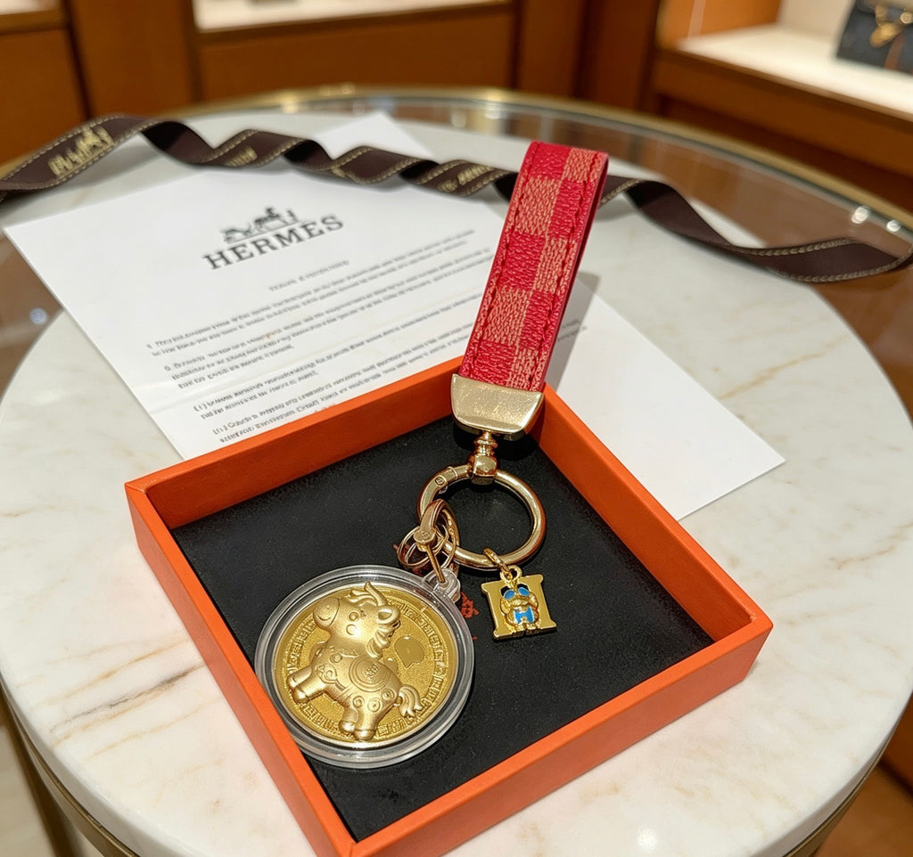 Hermès Gold-Tone H Medallion Keychain with Brown Strap - album image 4