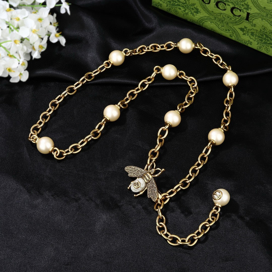 Gucci Gold-Tone Medallion Station Chain Necklace - album image 1