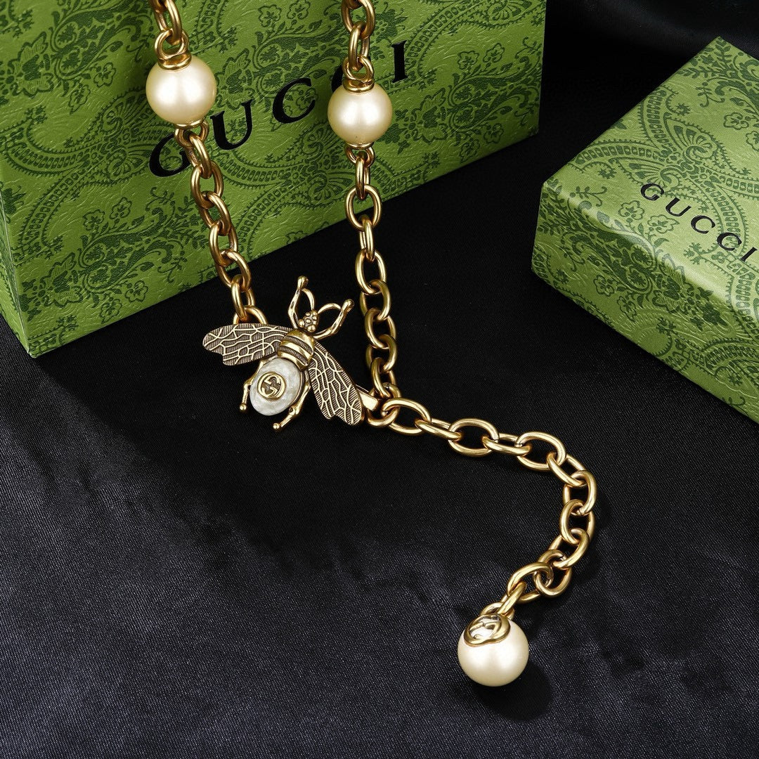 Gucci Gold-Tone Medallion Station Chain Necklace - album image 6