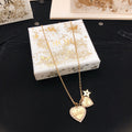 Dior Heart and Star Pendant Necklace - product image 1