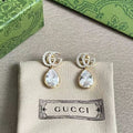 Gucci Gold-Tone GG and Teardrop Crystal Earrings - album image 1