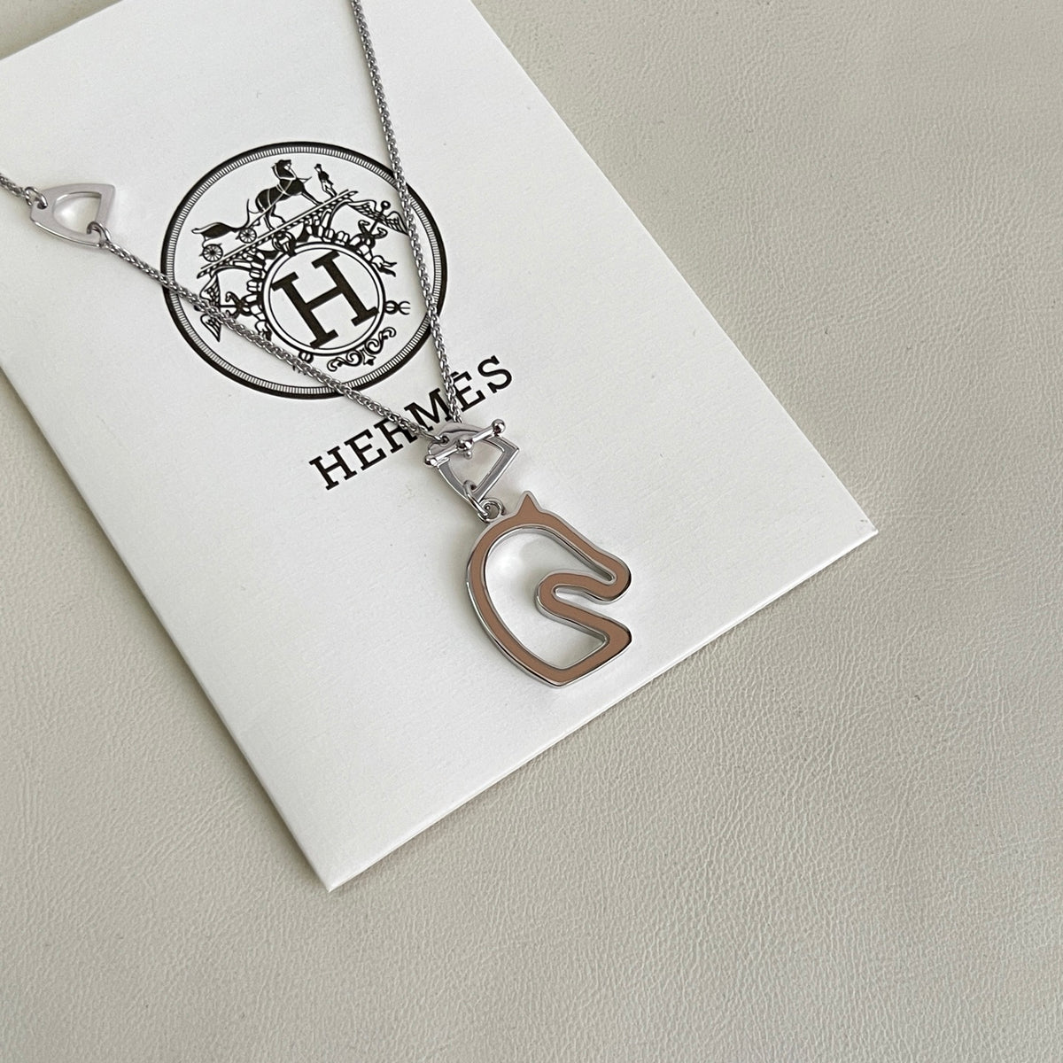 Hermès Silver-Tone H Disc and Horse-Outline Pendant Necklace - album image 5