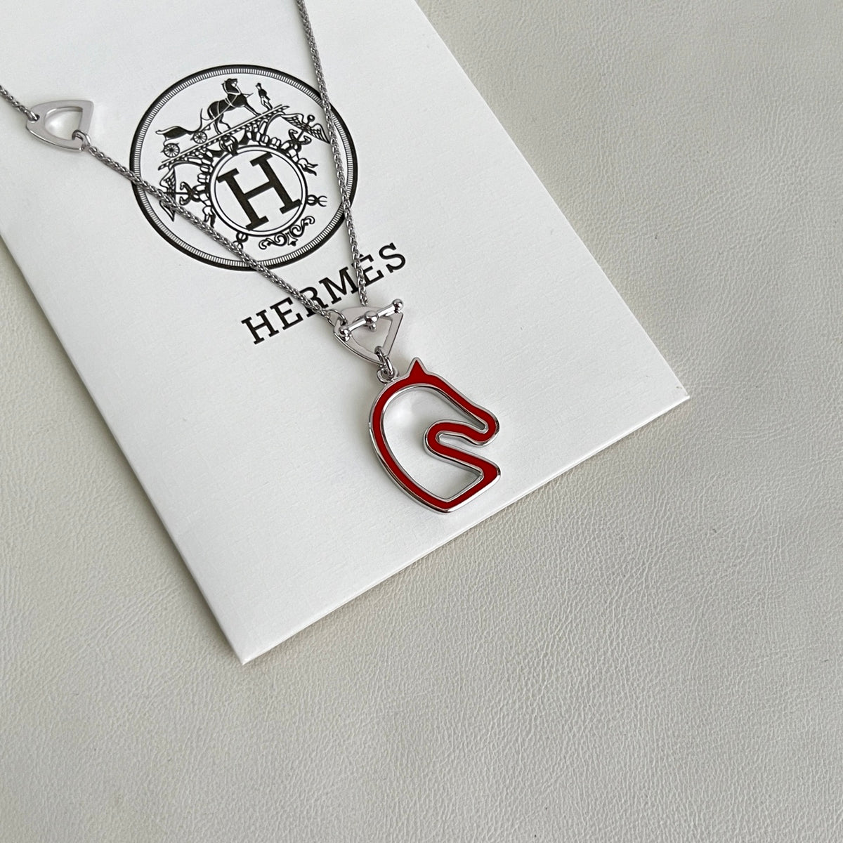 Hermès Silver-Tone H Disc and Horse-Outline Pendant Necklace - album image 2