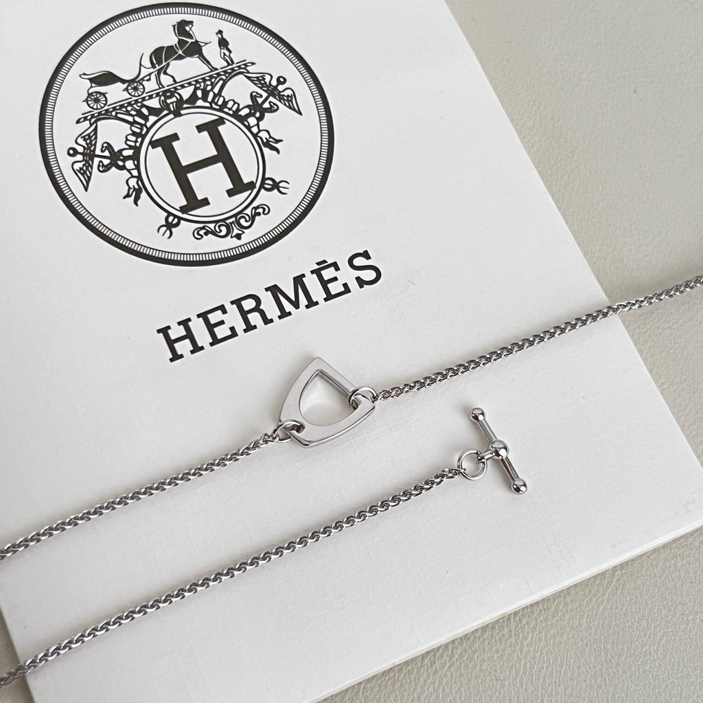 Hermès Silver-Tone H Disc and Horse-Outline Pendant Necklace - album image 9