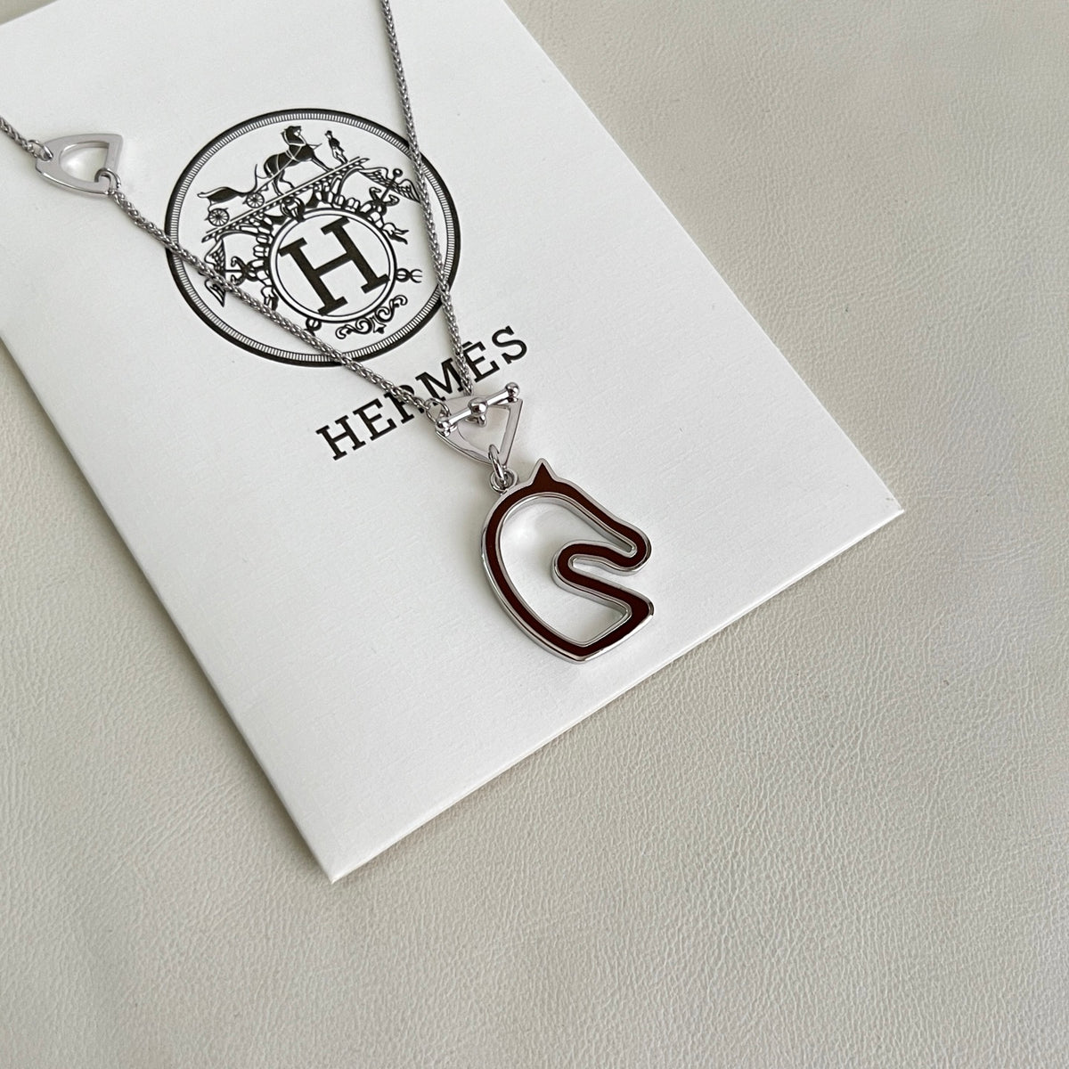 Hermès Silver-Tone H Disc and Horse-Outline Pendant Necklace - album image 3