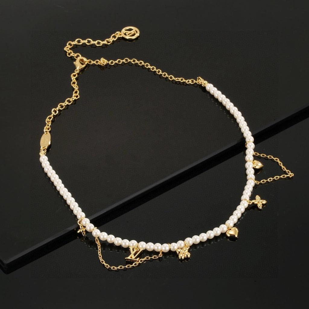 Louis Vuitton Pearl LV Letter Necklace - album image 3