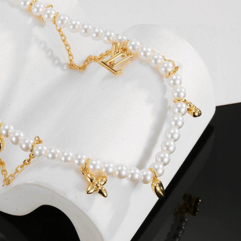 Louis Vuitton Pearl LV Letter Necklace - album image 7