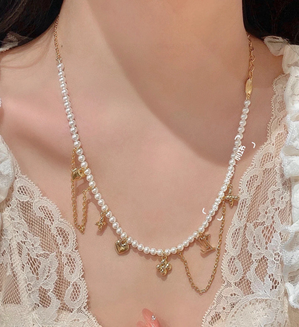 Louis Vuitton Pearl LV Letter Necklace - album image 1