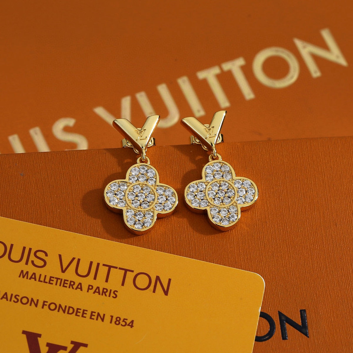Louis Vuitton Crystal Flower Stud Earrings - album image 1