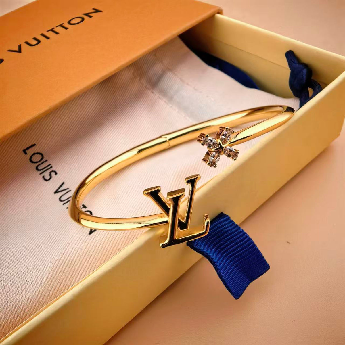 Louis Vuitton LV Letter Open Bangle - album image 1