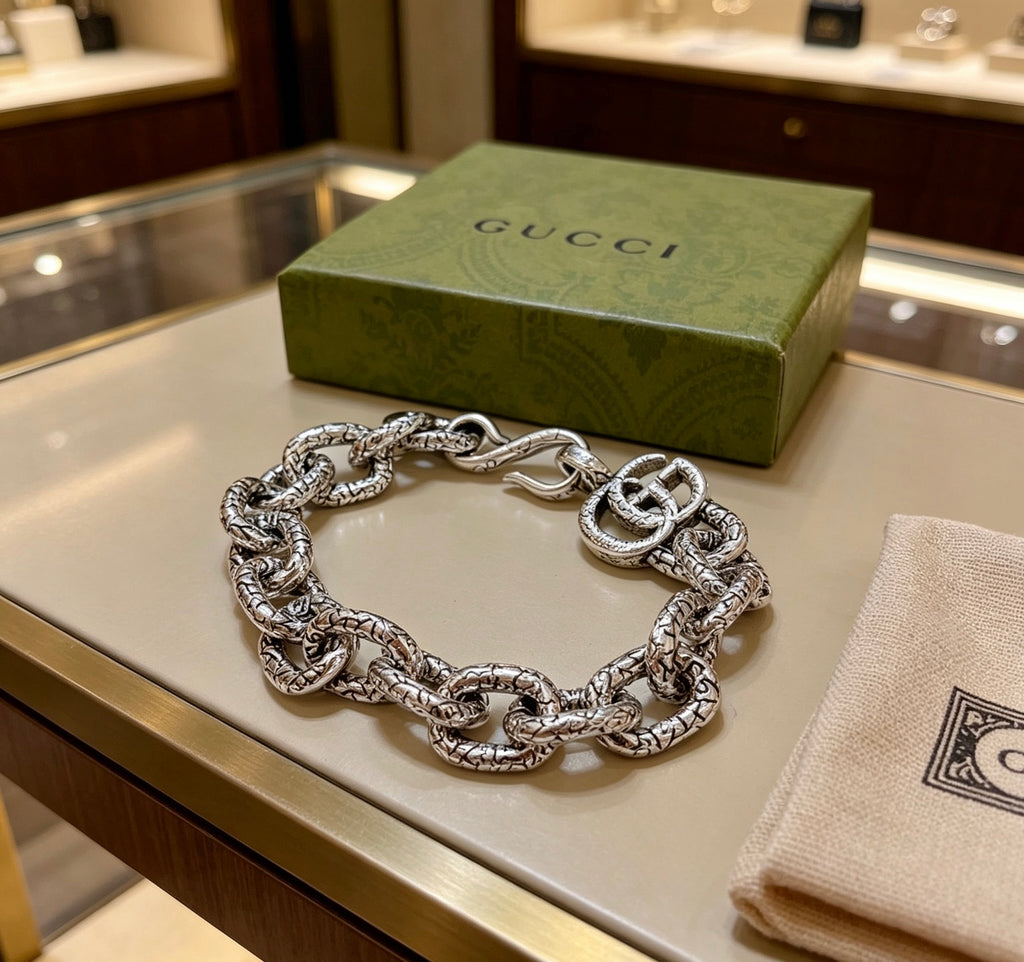 Gucci Silver-Tone Openwork Oval Link Bracelet with G Charm - album image 5