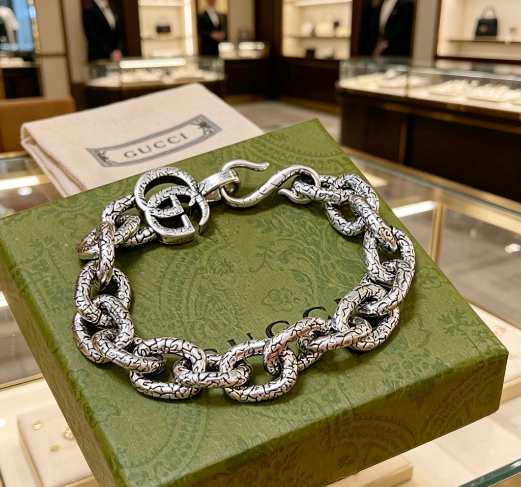 Gucci Silver-Tone Openwork Oval Link Bracelet with G Charm - album image 4