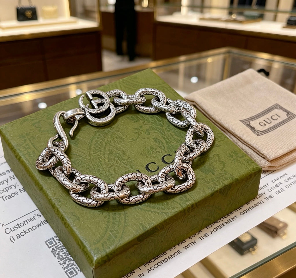 Gucci Silver-Tone Openwork Oval Link Bracelet with G Charm - album image 7