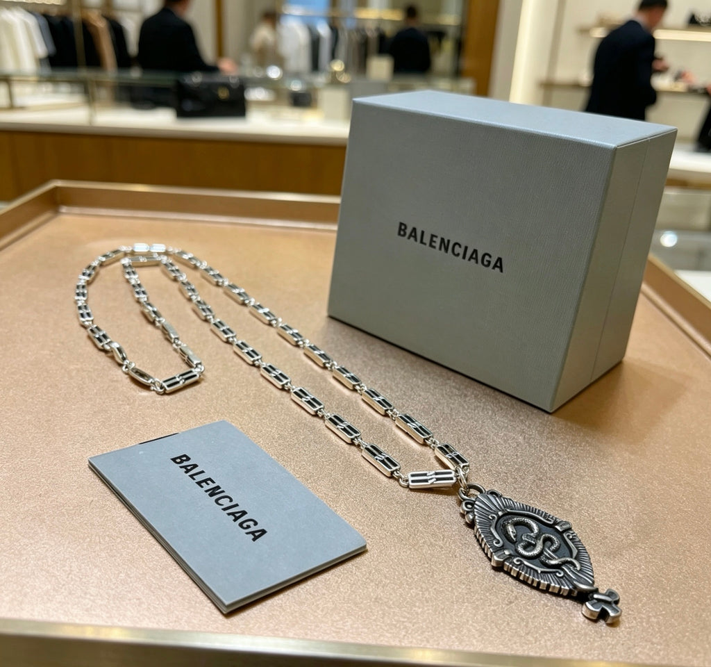 Balenciaga Silver-Tone Ornate Oval Pendant Necklace - album image 4