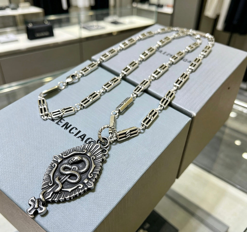 Balenciaga Silver-Tone Ornate Oval Pendant Necklace - album image 2