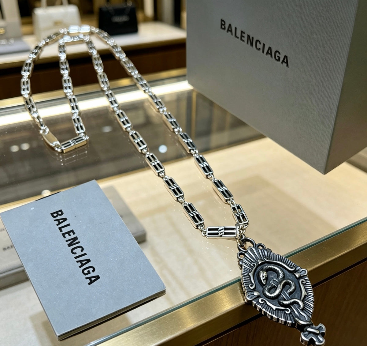 Balenciaga Silver-Tone Ornate Oval Pendant Necklace - album image 8