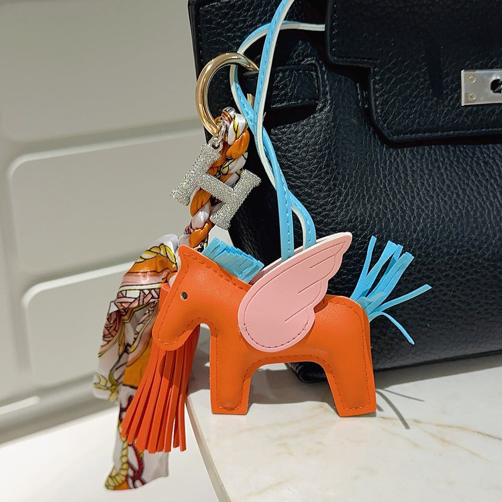 Hermès Orange Horse Bag Charm with Blue Cord and Tassel - album image 3