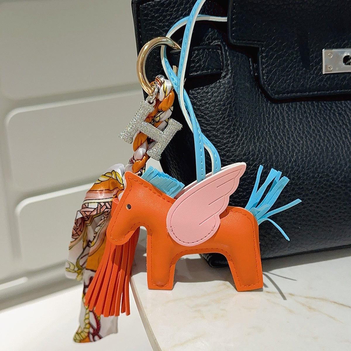 Hermès Orange Horse Bag Charm with Blue Cord and Tassel - album image 3