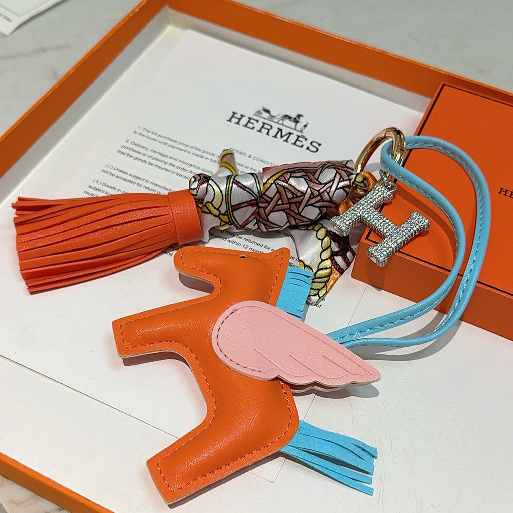 Hermès Orange Horse Bag Charm with Blue Cord and Tassel - album image 7