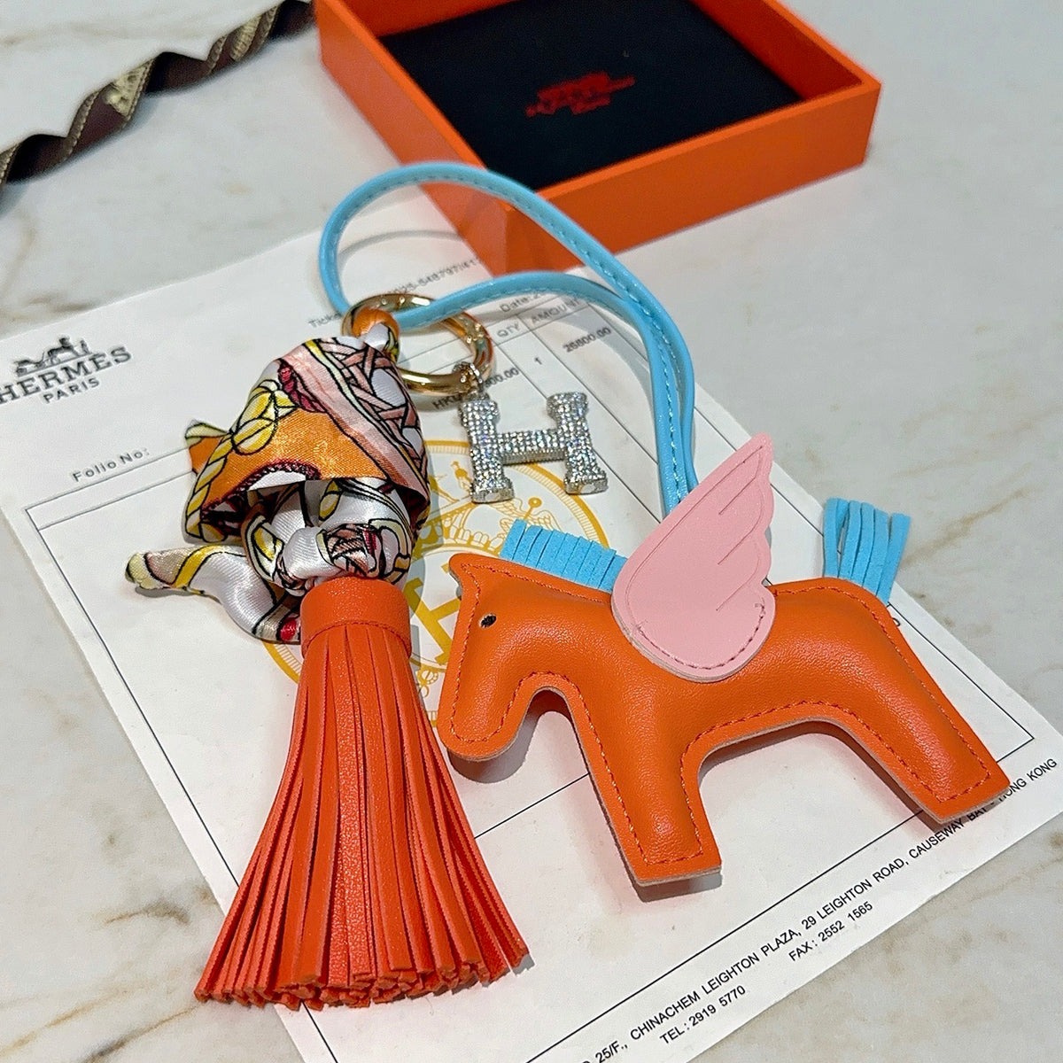 Hermès Orange Horse Bag Charm with Blue Cord and Tassel - album image 2