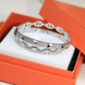 Hermès Silver-Tone Crystal Wide Anchor Band Ring - album image 1