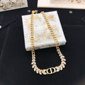 Dior Gold-Tone Repeating CD Necklace - product image 1