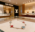 Louis Vuitton Two-Tone Flower Charm Bracelet with Blue Accent - album image 1