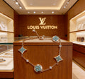 Louis Vuitton Gold-Tone Flower Charm Bracelet with Blue Accent - album image 1