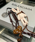 Balenciaga Cream Character Charm Keychain - album image 1