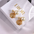 Dior Ribbed Shell Pearl-Look Earrings - product image 1