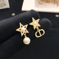 Dior Asymmetric Star and CD Earrings - product image 1