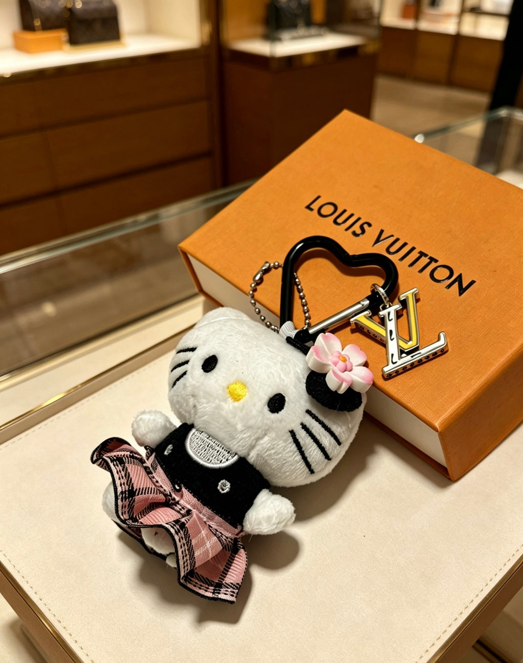 Louis Vuitton White Cat Keychain with Plaid Outfit - album image 5