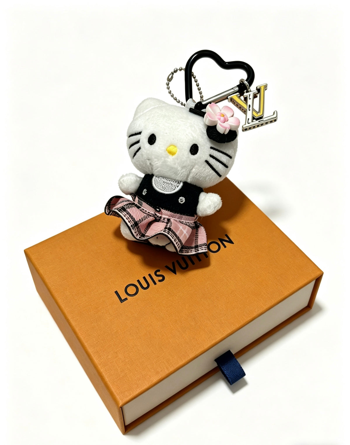Louis Vuitton White Cat Keychain with Plaid Outfit - album image 2