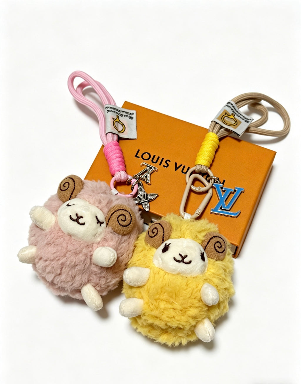 Louis Vuitton Pastel Plush Character Keychain in Pink and Yellow - album image 1