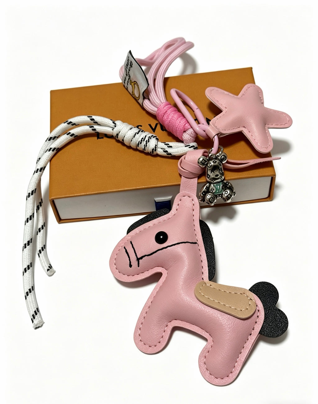Louis Vuitton Running Character Keychain in Multiple Colors - album image 3