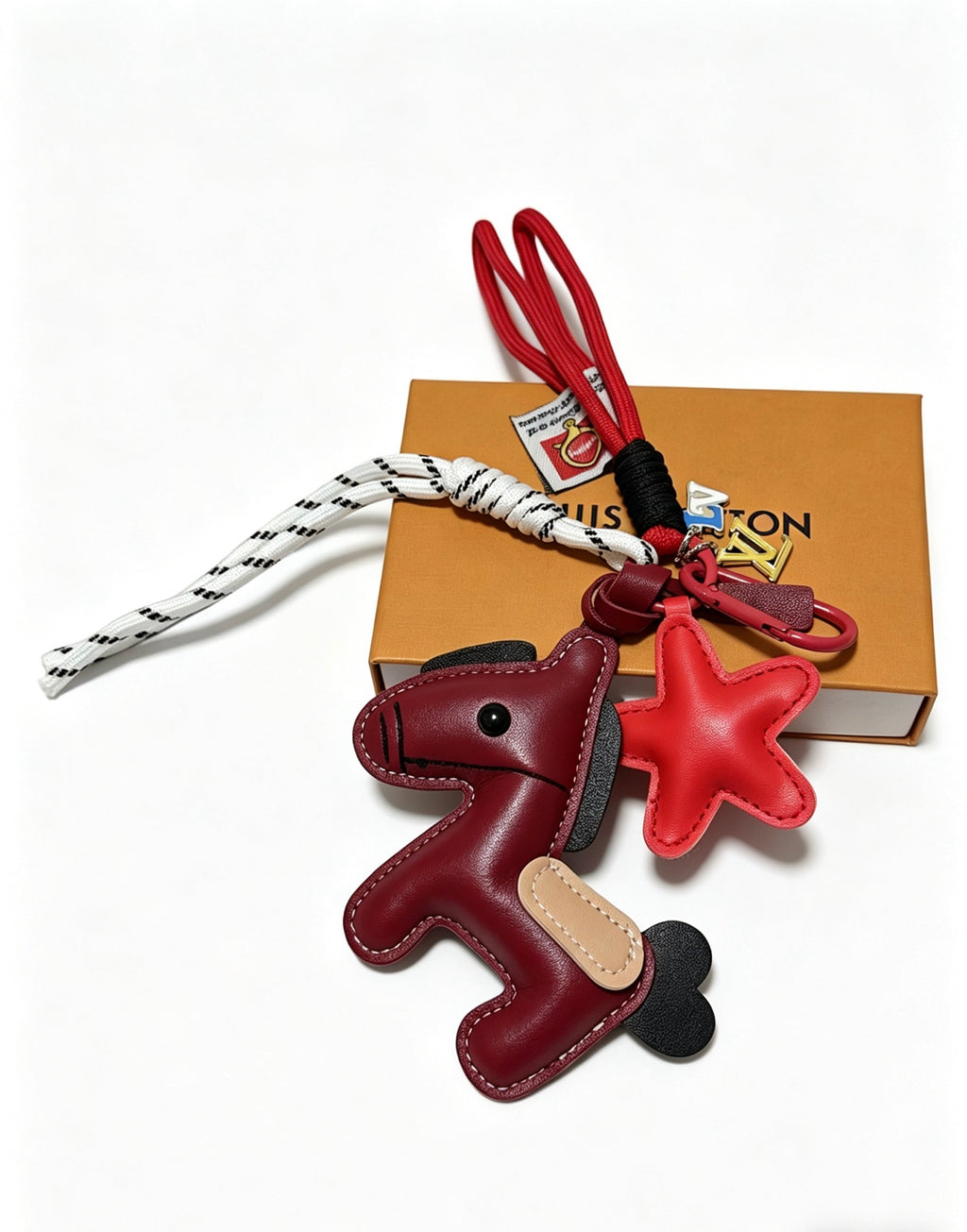 Louis Vuitton Burgundy Running Character Keychain - album image 1