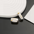 Saint Laurent White Enamel Gold-Tone Huggie Hoop Earrings - album image 1