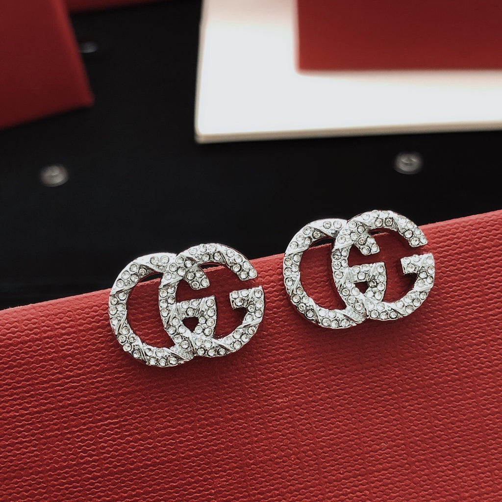 Gucci Silver-Tone Twisted Mini Earrings - album image 1
