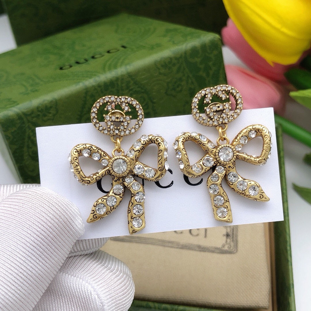 Gucci Interlocking G Bow Butterfly Earrings - album image 1
