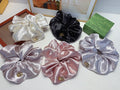 Gucci Satin-Look Scrunchie in Multiple Colors - album image 1