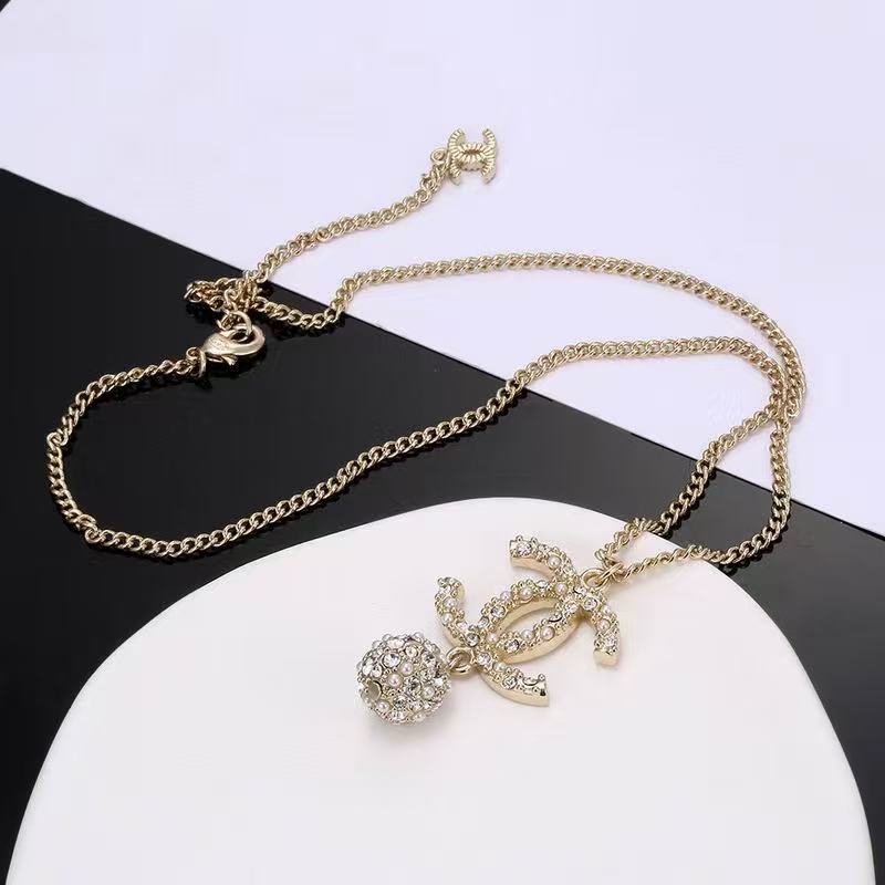 Chanel Interlocking C Pearl Circular Pendant Necklace - album image 1