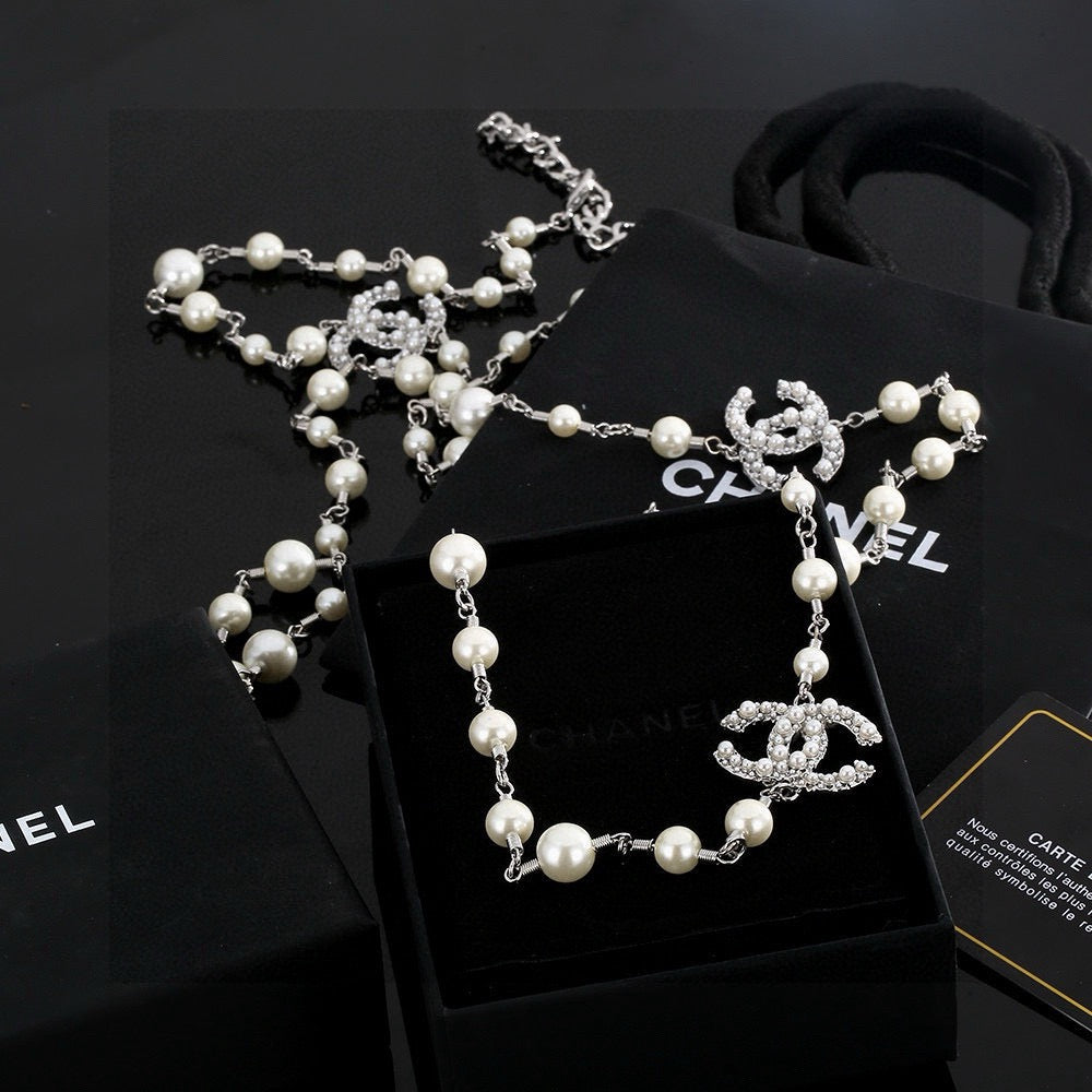 Chanel Interlocking C Pearl Necklace - album image 2