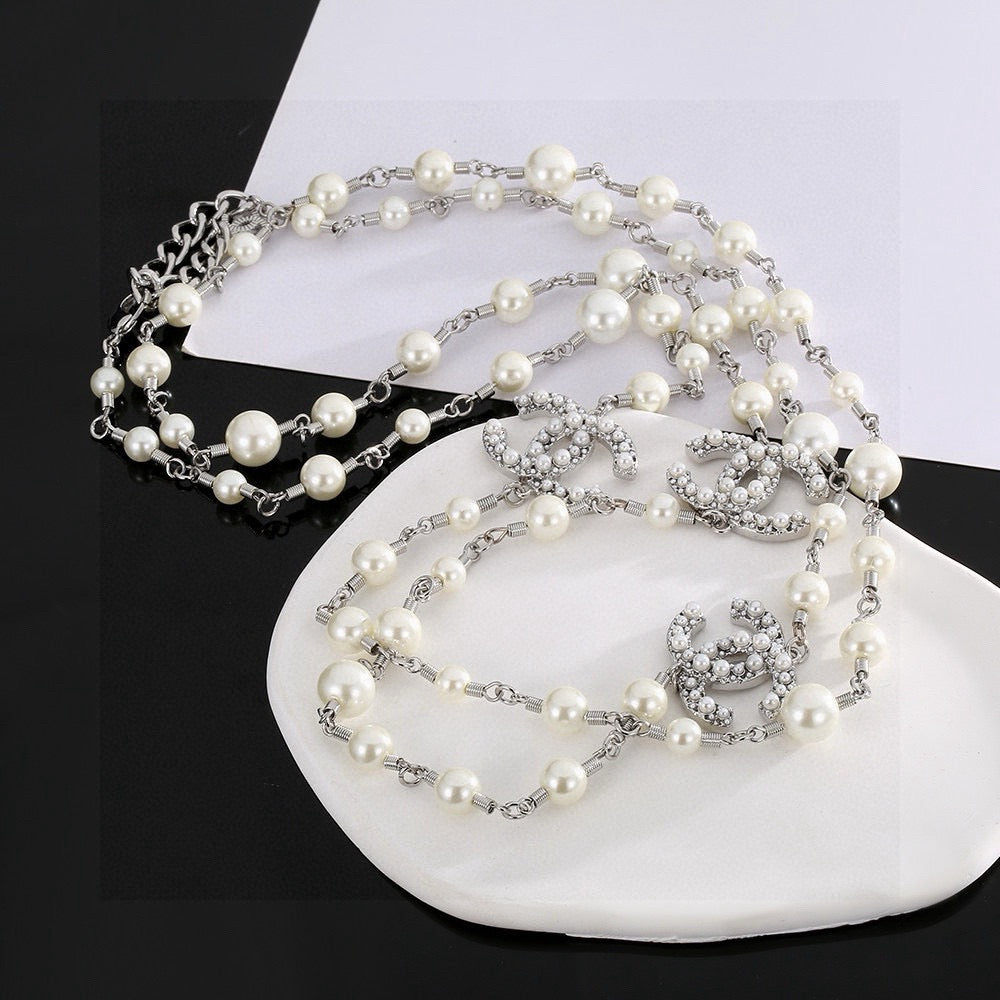 Chanel Interlocking C Pearl Necklace - album image 9