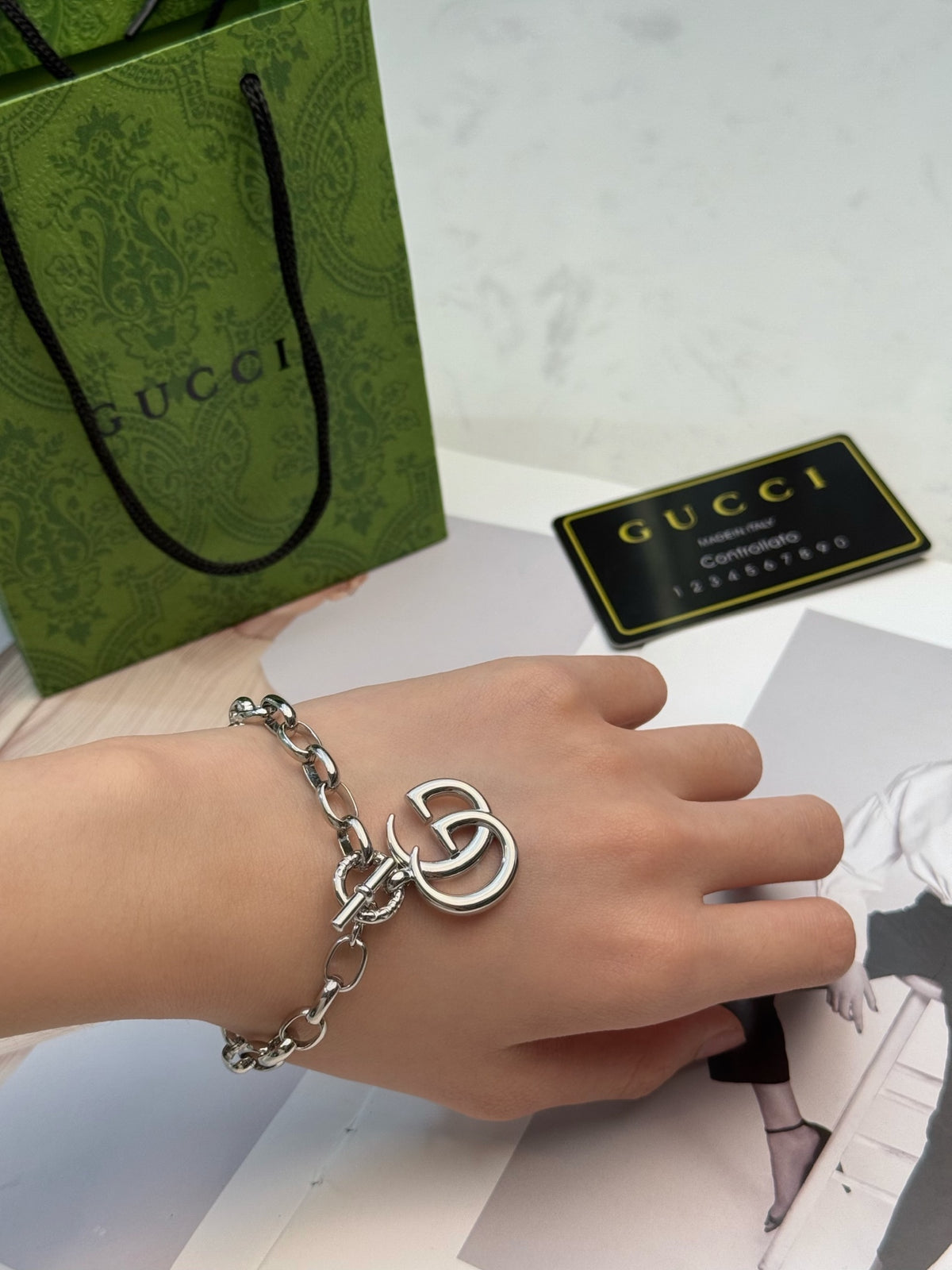 Gucci Silver-Tone Heart and G Charm Bracelet - album image 1