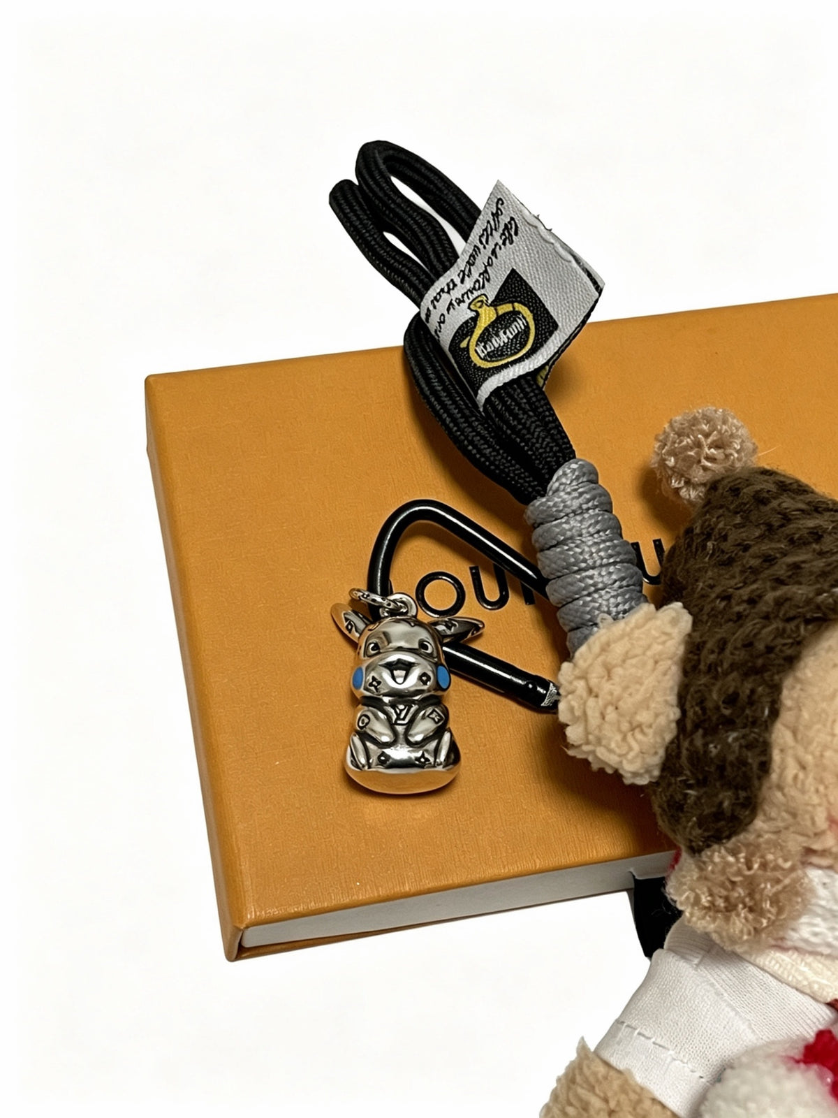 Louis Vuitton Brown Plush Character Keychain in Patterned Outfits - album image 8