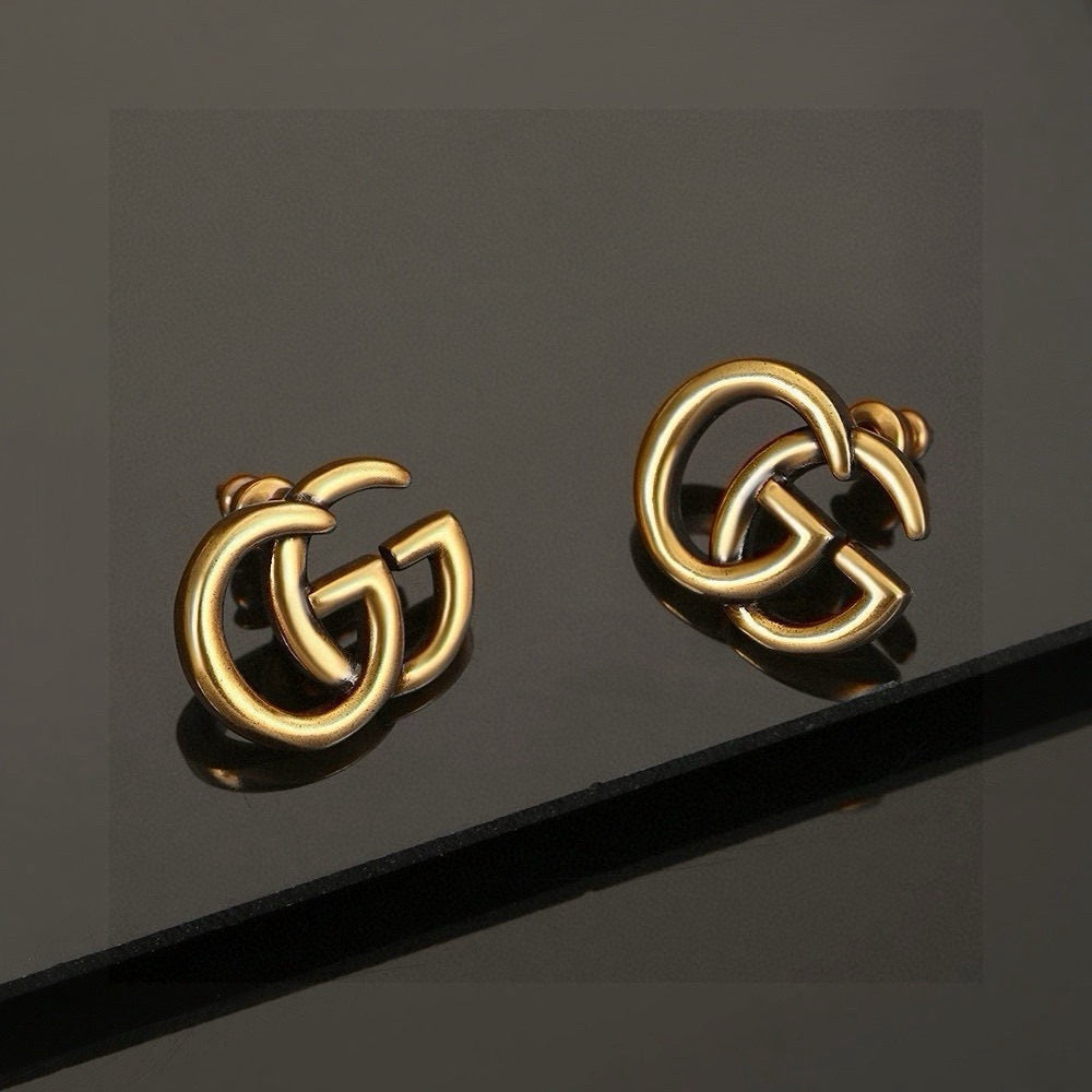 Gucci Gold-Tone Interlocking G Stud Earrings - album image 3