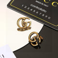 Gucci Gold-Tone Interlocking G Stud Earrings - album image 1
