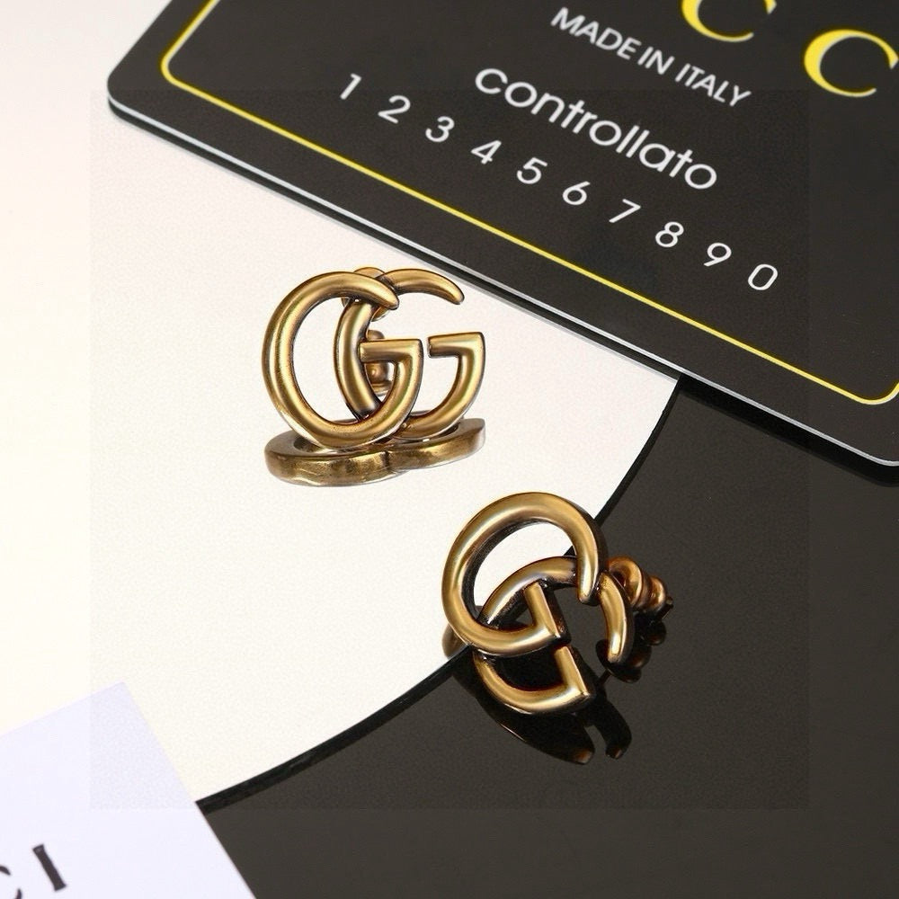 Gucci Gold-Tone Interlocking G Stud Earrings - album image 1