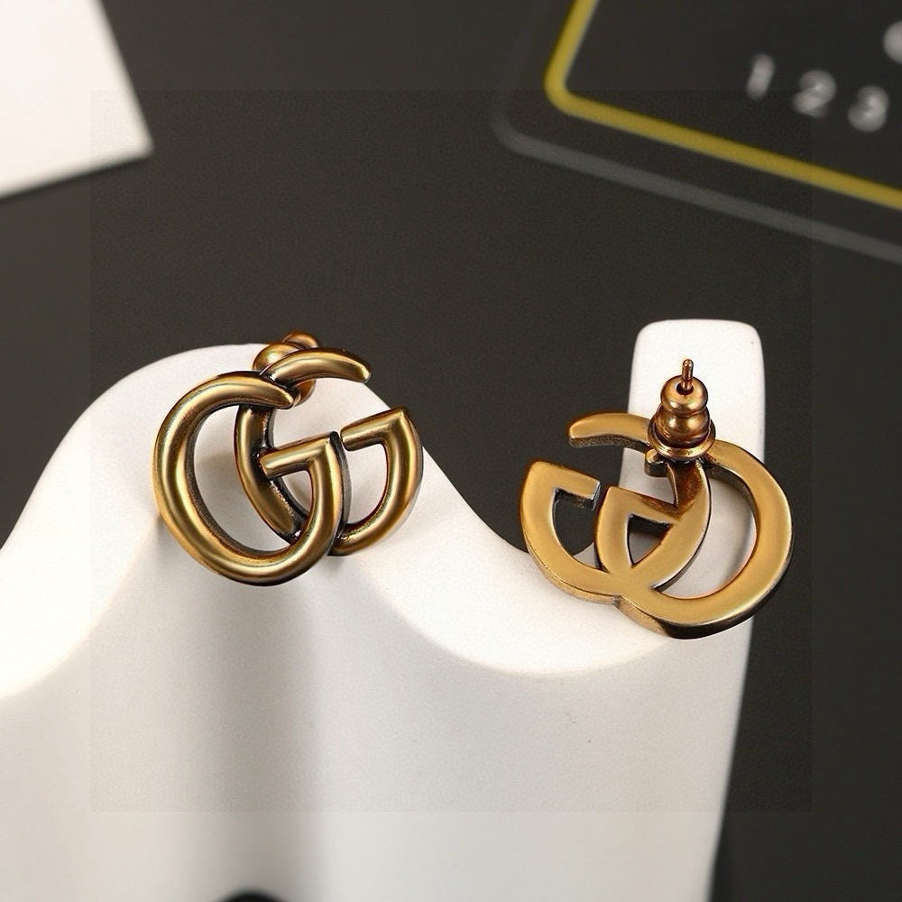 Gucci Gold-Tone Interlocking G Stud Earrings - album image 6